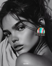 A woman wears the Aabshaar handmade stud earrings, their vibrant semi-circle design in green, red, white, and blue beautifully highlighted against her skin, while oxidized silver ghungroos dangle delicately below—capturing the essence of playful elegance — Muselot.