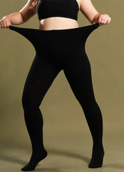 A woman wearing black tights and a bra top, showcasing a stylish and athletic tights- Muselot