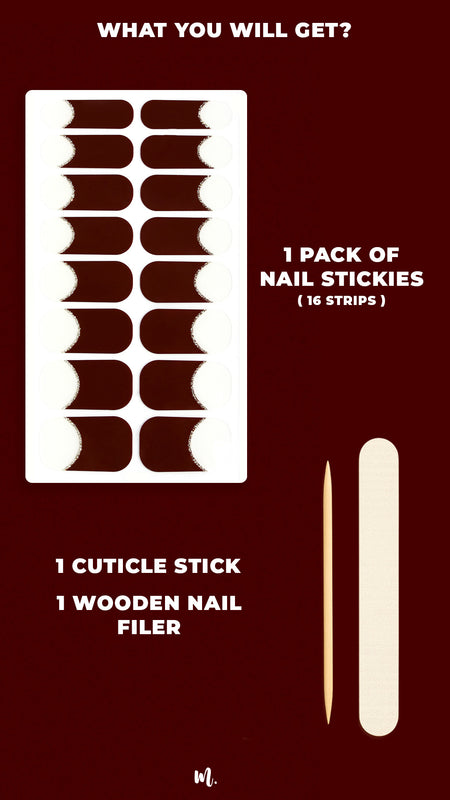 A flat-lay shot of the Cherry Moon French Tip nail stickies kit, showcasing a complete set with deep maroon glossy French tip strips outlined by a fine silver glitter curve, accompanied by a cuticle stick and a wooden nail filer, highlighting everything included to achieve a bold and elegant French manicure at home – Muselot.