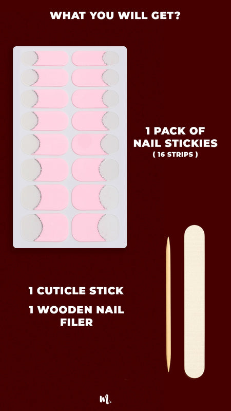 A flat-lay shot of the Crowned Petal French nail design kit, showcasing the complete set with pink French tip nail stickies accented by a silver glitter curve, along with a cuticle stick and a wooden nail filer, highlighting everything included for achieving a flawless salon-style French manicure at home – Muselot.