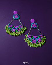 Gulbahaar chandbali earrings with vivid purple and green floral hand-painted patterns, finished with dangling yellow beads, highlighting their bold handcrafted appeal — Muselot.