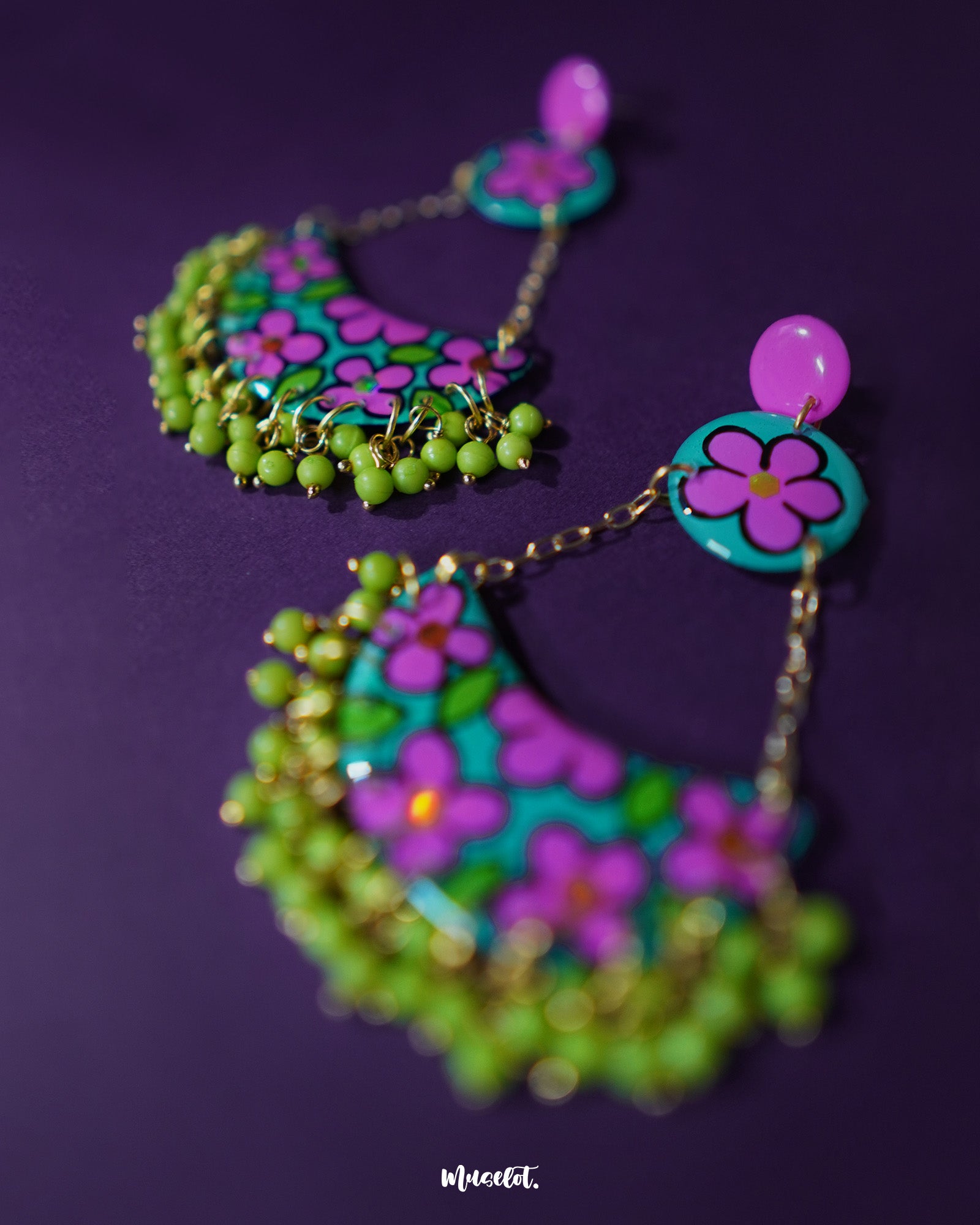Close-up of Gulbahaar chandbali earrings, highlighting the intricate floral artwork and detailed beaded edge that adds a traditional yet elegant touch — Muselot.