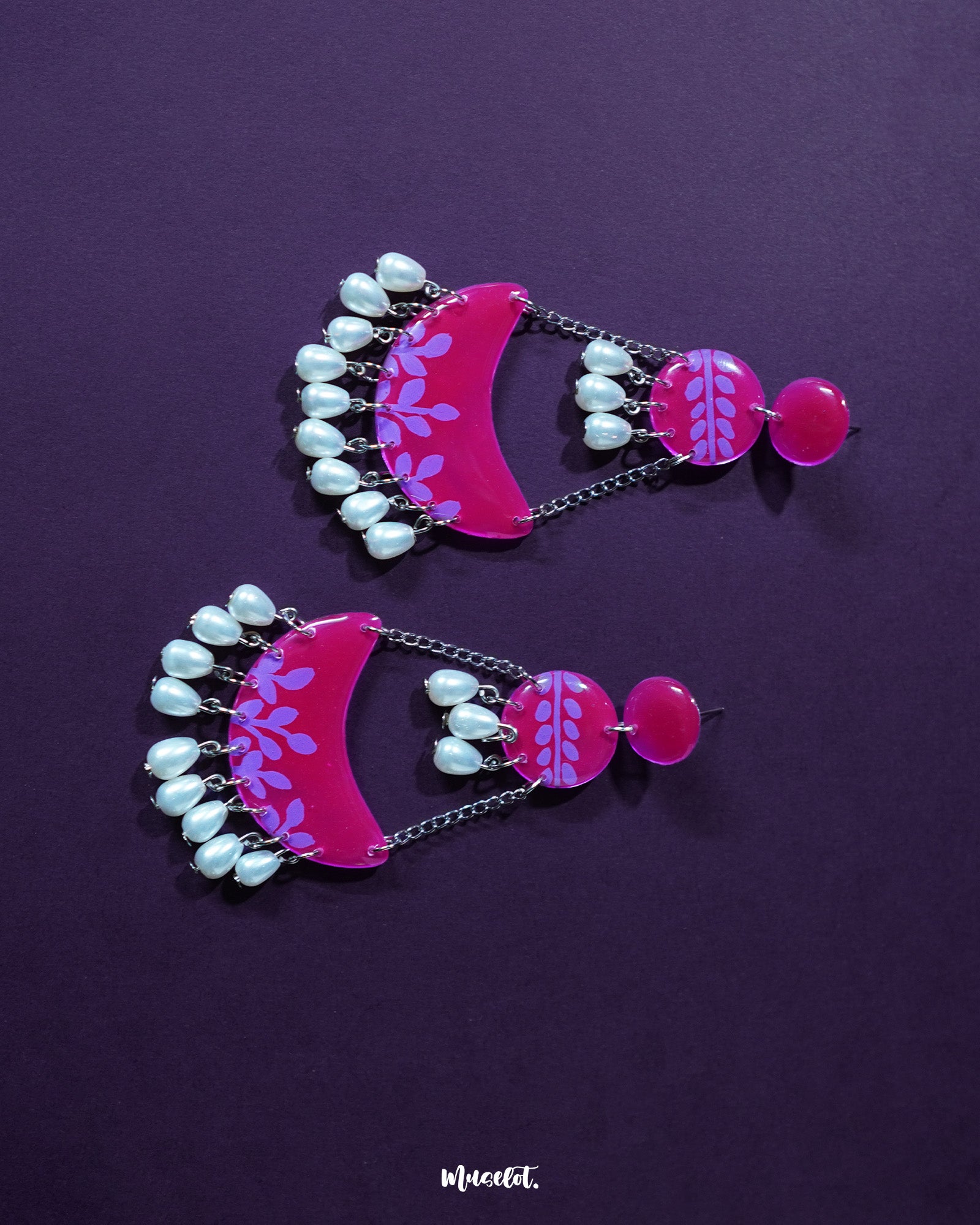 Gulfaam pink pearl chandbali earrings featuring radiant magenta tones with intricate floral motifs and dangling pink pearls, capturing a blend of traditional richness and contemporary elegance — Muselot.