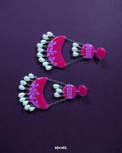 Gulfaam pink pearl chandbali earrings featuring radiant magenta tones with intricate floral motifs and dangling pink pearls, capturing a blend of traditional richness and contemporary elegance — Muselot.