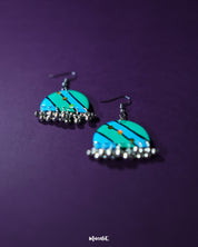 Jaltarang strip earrings displayed against a soft-toned background, highlighting their linear silhouette and handcrafted details that exude minimalist elegance—Muselot.