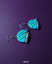 the Jaltarang strip earrings shows their linear design and sleek, metallic finish, perfect for a modern and elegant look—Muselot.