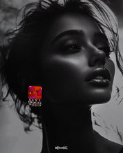 The model wearing the Laalsavera stud earrings, with the deep background subtly highlighting the earrings elegant design and making them stand out as a statement piece – Muselot