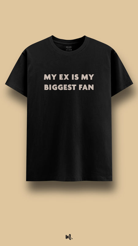 Black graphic t-shirt showcasing the “My Ex Is My Biggest Fan” statement, highlighting a bold, unapologetic vibe against a clean, minimal beige background – Muselot