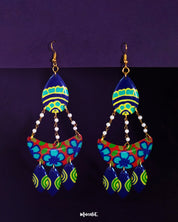 Mayoori chandbali earrings, set against a soft backdrop, with intricate designs and elegant detailing that capture a traditional yet modern charm, adding timeless sophistication to any look — Muselot.