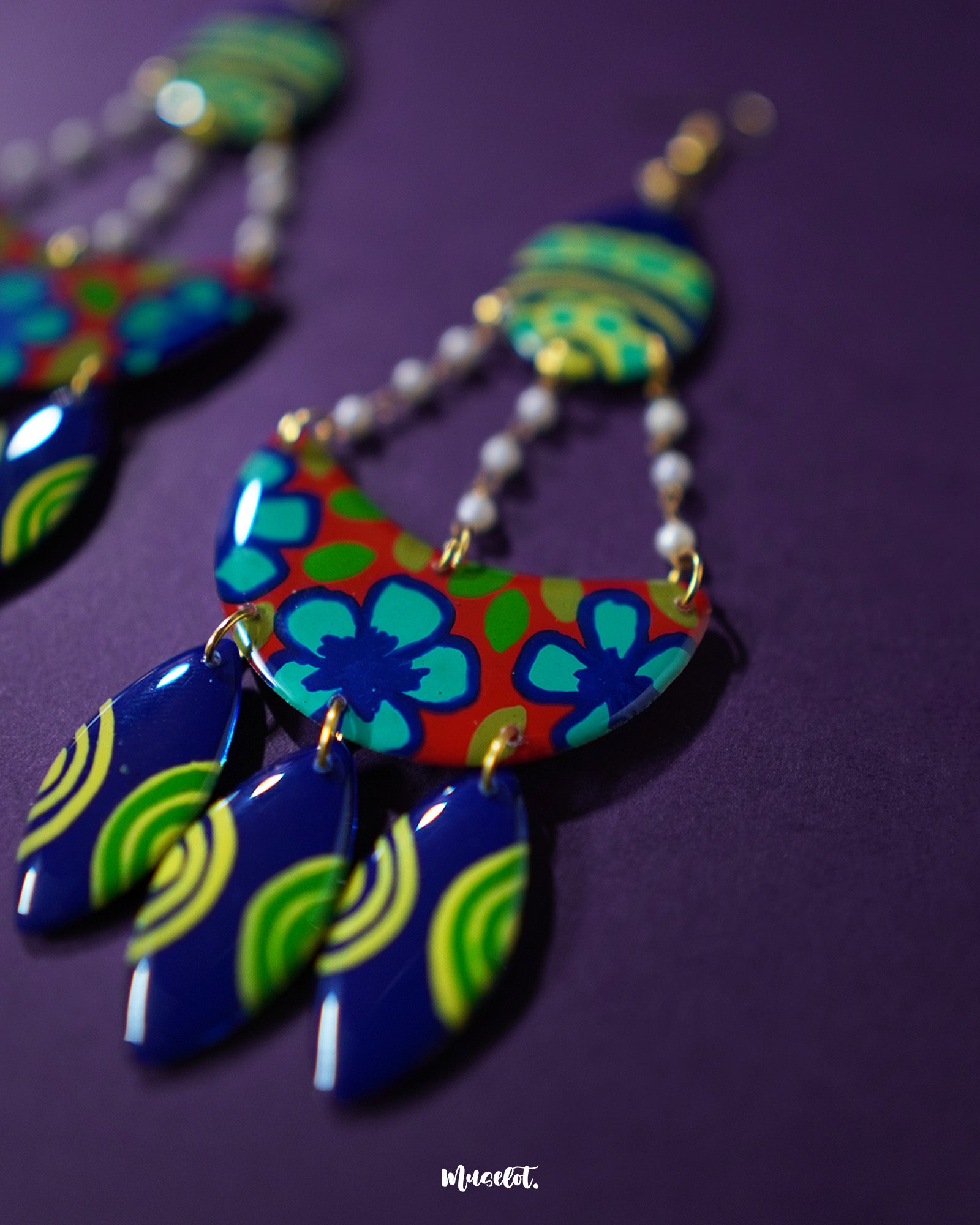 Mayoori chandbali earrings, highlighted against a subtle backdrop, featuring delicate craftsmanship and traditional design elements that add a regal and timeless elegance to any look — Muselot.