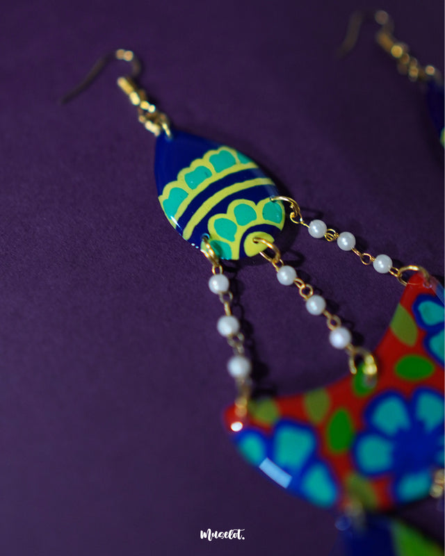 Mayoori chandbali earrings, set against a soft-toned backdrop, showcasing intricate detailing and a graceful design that brings out a perfect blend of traditional charm and modern elegance — Muselot.