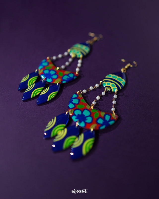 Mayoori chandbali earrings, set against a subtle background, with intricate patterns and a graceful design that exude classic elegance, offering a perfect fusion of tradition and sophistication — Muselot.