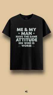 Black graphic t-shirt showcasing the “Me & My Man Have the Same Attitude IDK Who Is Worse” statement, highlighting a confident, fun, and slightly chaotic couple vibe against a clean beige background – Muselot