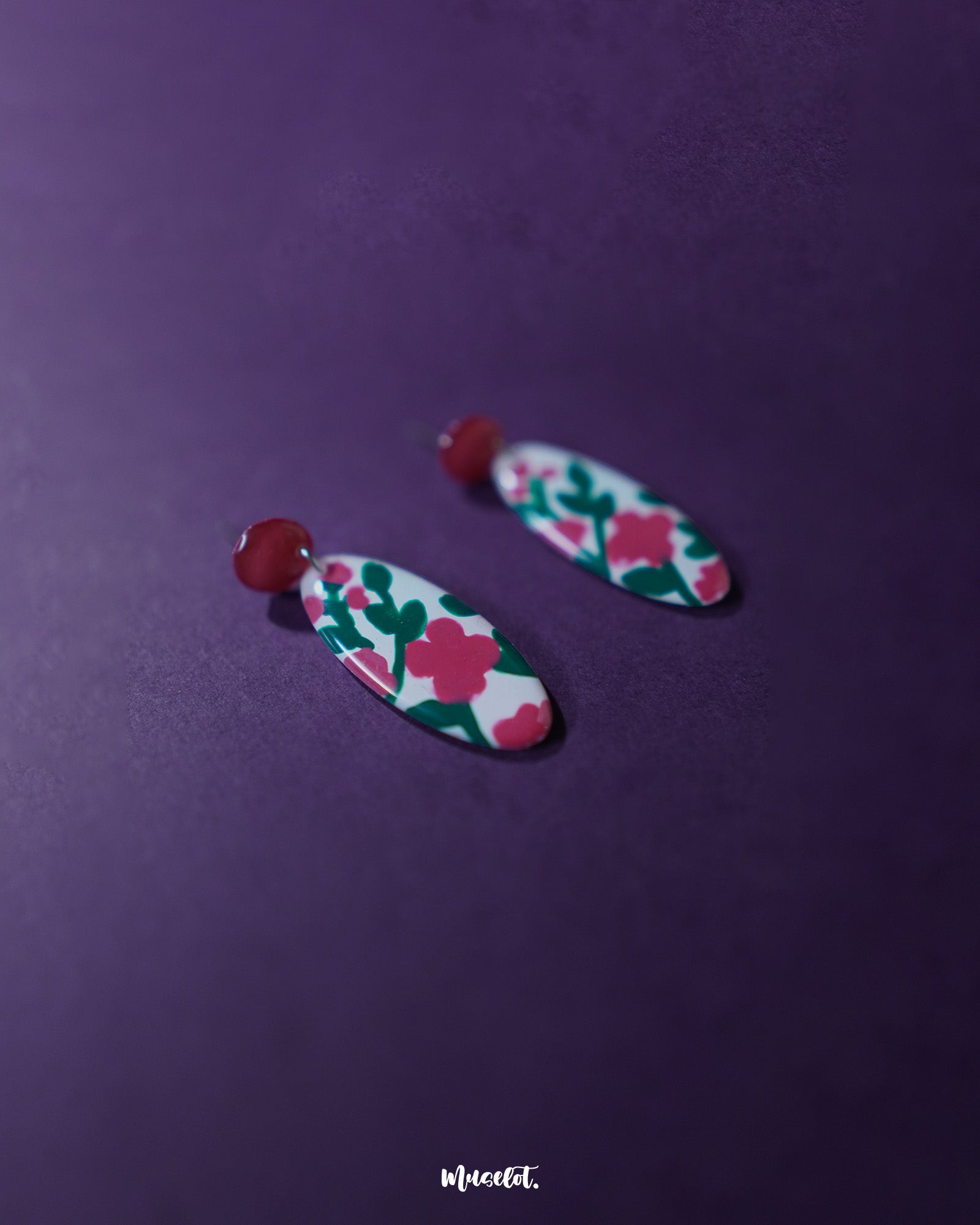 Close-up of the Nargis pink floral drop earrings with focus on the intricate flower details and pastel pink tones, highlighting the handcrafted finesse and lightweight design — Muselot.
