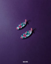 Nargis pink floral drop earrings placed aesthetically, showcasing the delicate petal structure, soft pink color palette, and artisanal charm — Muselot.