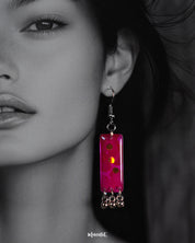 A model flaunting the Noorasa drop earrings, highlighting their graceful charm and adding a statement touch to the look – Muselot