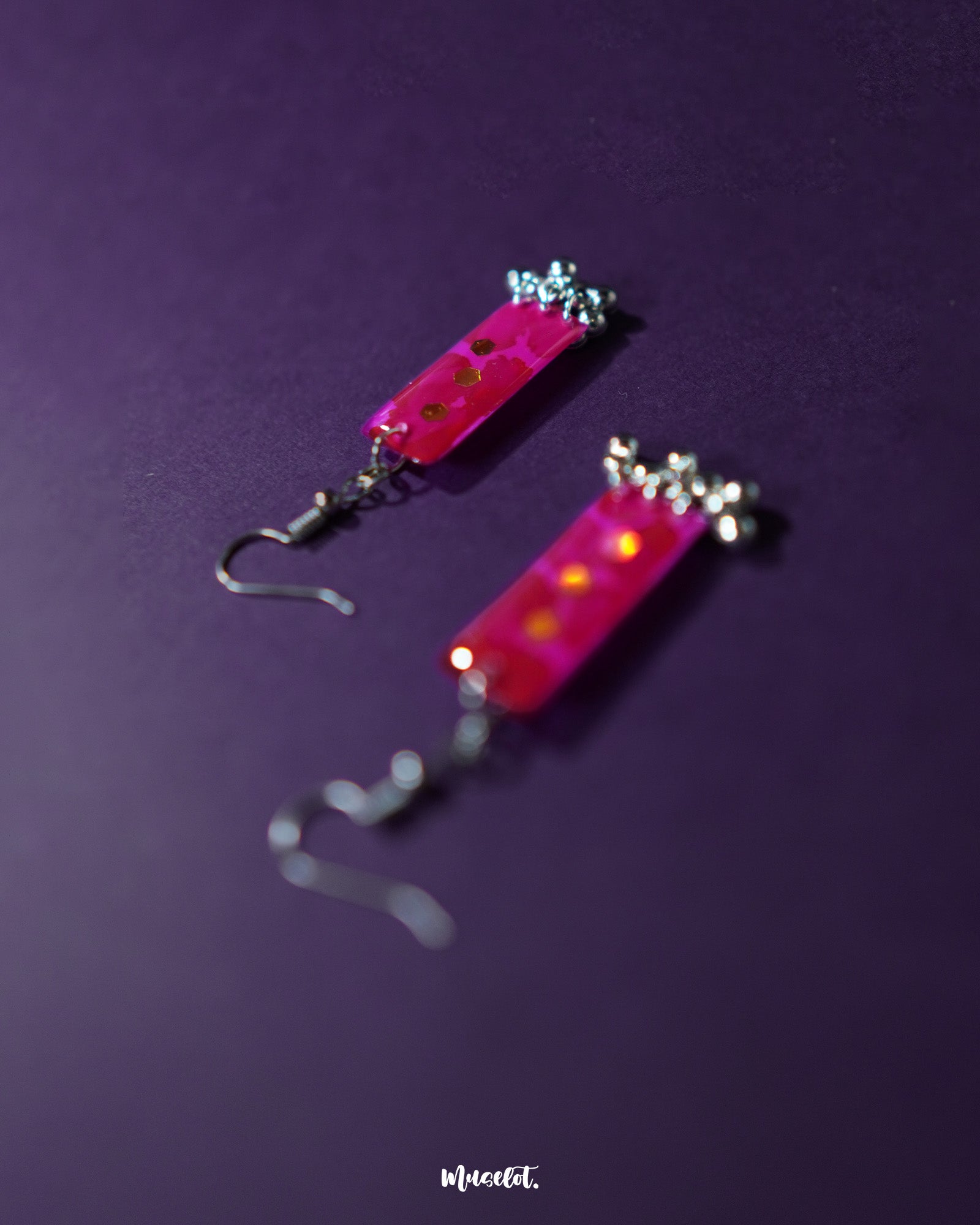 Noorasa drop earrings displayed on a solid background, showcasing their delicate craftsmanship and timeless charm – Muselot