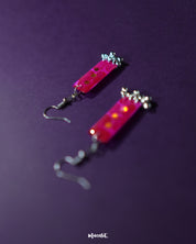 Noorasa drop earrings displayed on a solid background, showcasing their delicate craftsmanship and timeless charm – Muselot