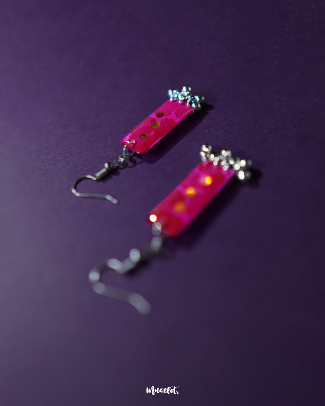 Noorasa drop earrings displayed on a solid background, showcasing their delicate craftsmanship and timeless charm – Muselot