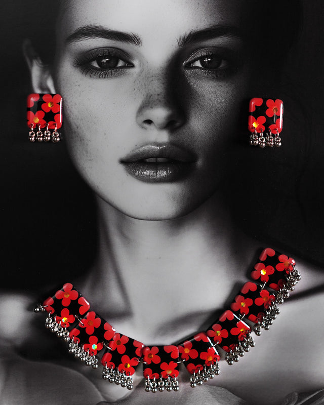 The model wearing Raktphool floral jewelry set, features delicate floral designs that add elegance and charm to any look, set against a rich background — Muselot.