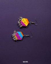 the Rangbahaar colorful hook earrings, showcasing the vibrant multicolor hexagonal design with glinting sequin accents and delicate silver bead danglers that sway gracefully — Muselot