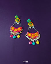 Delicately crafted with vibrant enamel hues and intricate detailing, the Rangsiya colorful chandbali earrings exude festive charm and timeless elegance, making them a standout accessory for ethnic ensembles — Muselot.