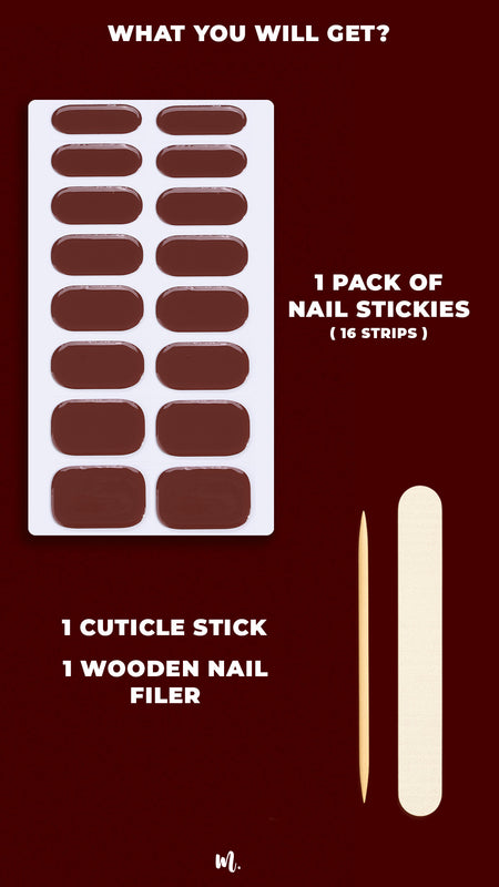 A image of Rich Cocoa nail art kit, showcasing everything included in the pack – glossy mauve nail stickies in multiple sizes, a cuticle stick and mini nail filer, highlighting the complete set for a perfect at-home manicure – Muselot.