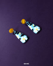 Shaamgul floral drop earrings with a distinctive shape, featuring delicate floral patterns and pastel-toned beads, highlighting their intricate craftsmanship and boho elegance — Muselot.