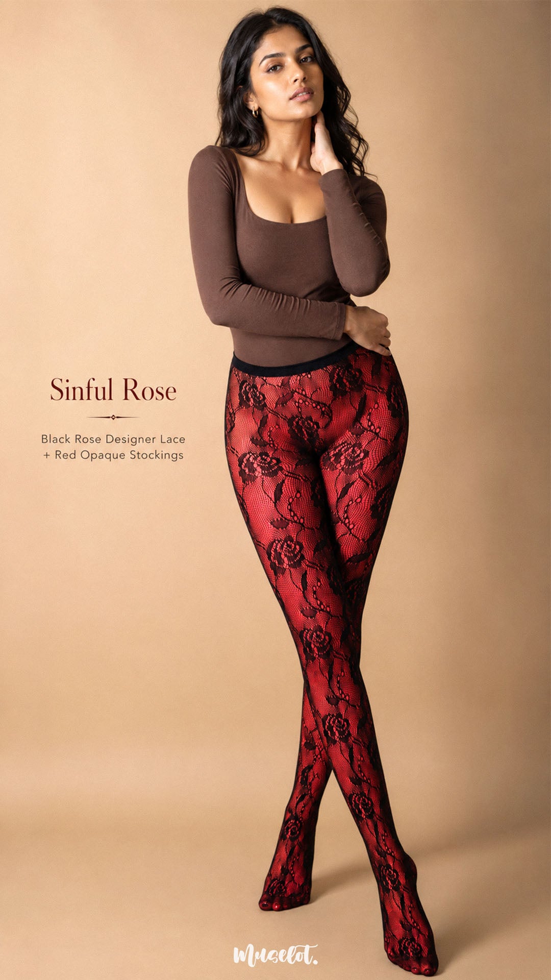 The model wears the complete Sinful Rose combination with black rose designer lace over red opaque stockings, showcasing the statement floral layering effect and full-length fit – Muselot.