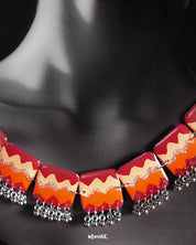 Close-up view of the Sehrish handmade traditional necklace set worn by the model, highlighting the intricate beadwork, vibrant colors, and fine craftsmanship that showcase its rich cultural heritage — Muselot