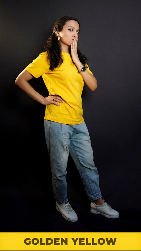 A model in a cute pose wearing women's plus size plain cotton stretchable golden yellow T shirt-Muselot