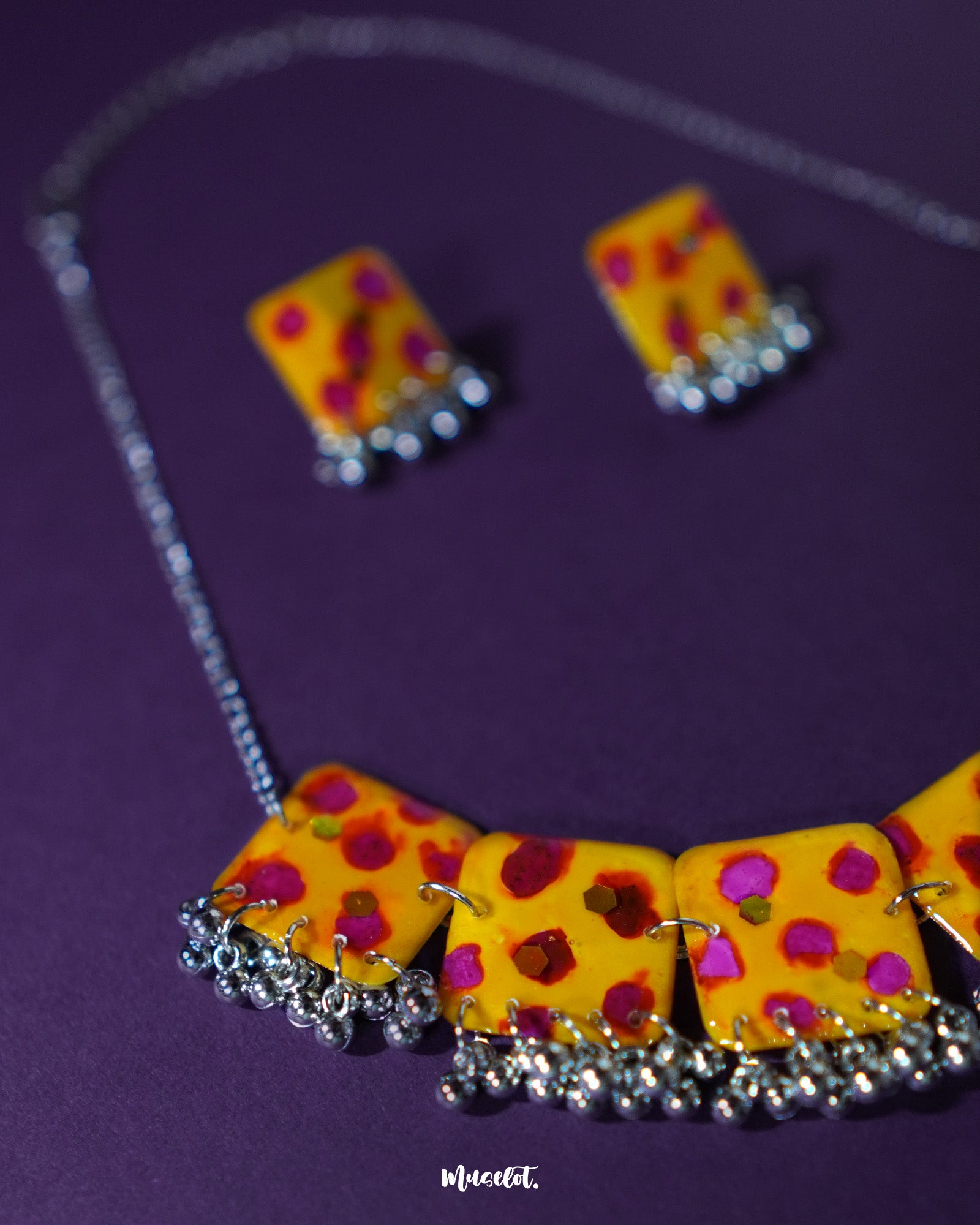 Full Zard Bahaar yellow floral jewelry set with necklace and earrings, highlighting hand-painted tiles and silver ghungroo accents, displayed against a clean background – Muselot.