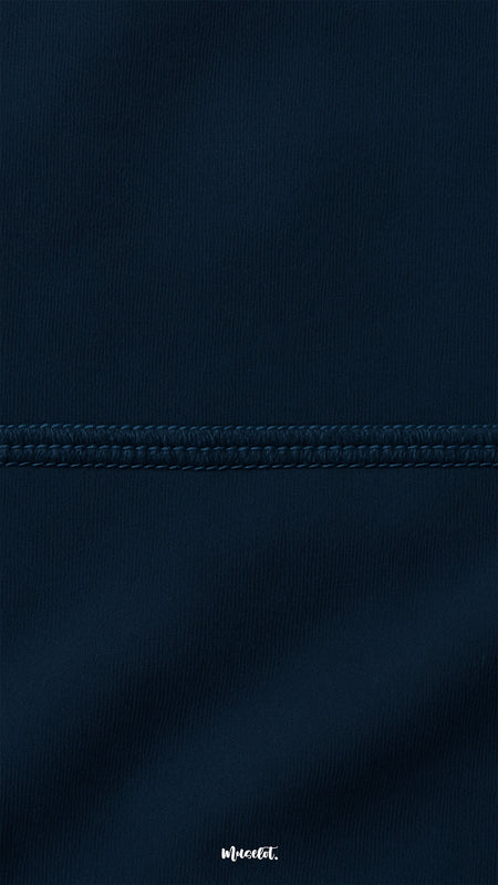 A detailed close-up of navy blue semi-opaque tights fabric with fine stitching, highlighting comfort, durability, and premium craftsmanship - Muselot