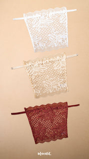 A pack of 3 deep neck cover-up displayed on a beige background, featuring white, beige and burgundy lace neckline inserts with premium floral lace detailing, adjustable straps and elegant modesty coverage for deep neck tops, blouses and dresses-Muselot