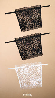 Three lace clip-on neckline covers in black and white displayed on a beige background, featuring floral lace detailing, adjustable straps and elegant coverage for deep neck tops, dresses and blouses, offering a stylish alternative to camisoles and modesty panels – Muselot