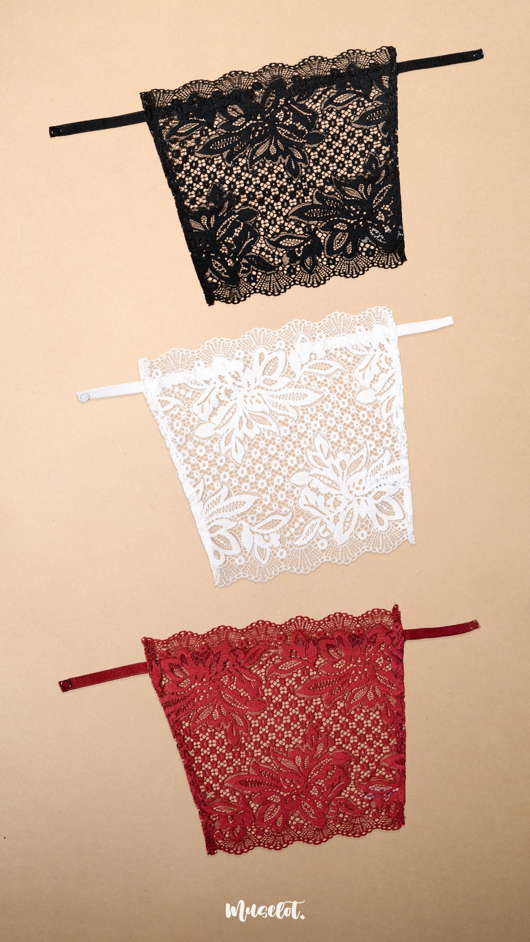 Three floral lace deep neck cover-up camisoles in black, white and maroon arranged on a beige background, showcasing versatile colour options for neckline coverage, layering and styling with dresses, tops and blouses – Muselot