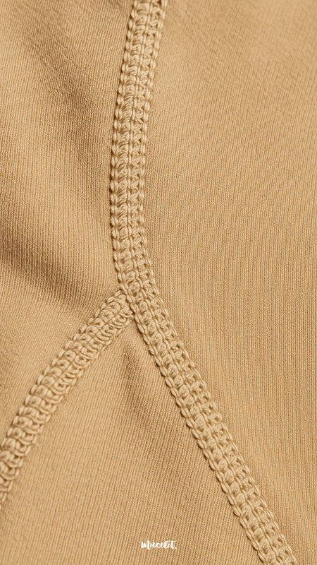 A detailed close-up of double-stitched skin opaque tights, highlighting reinforced seams, strength, and long-lasting wear - Muselot