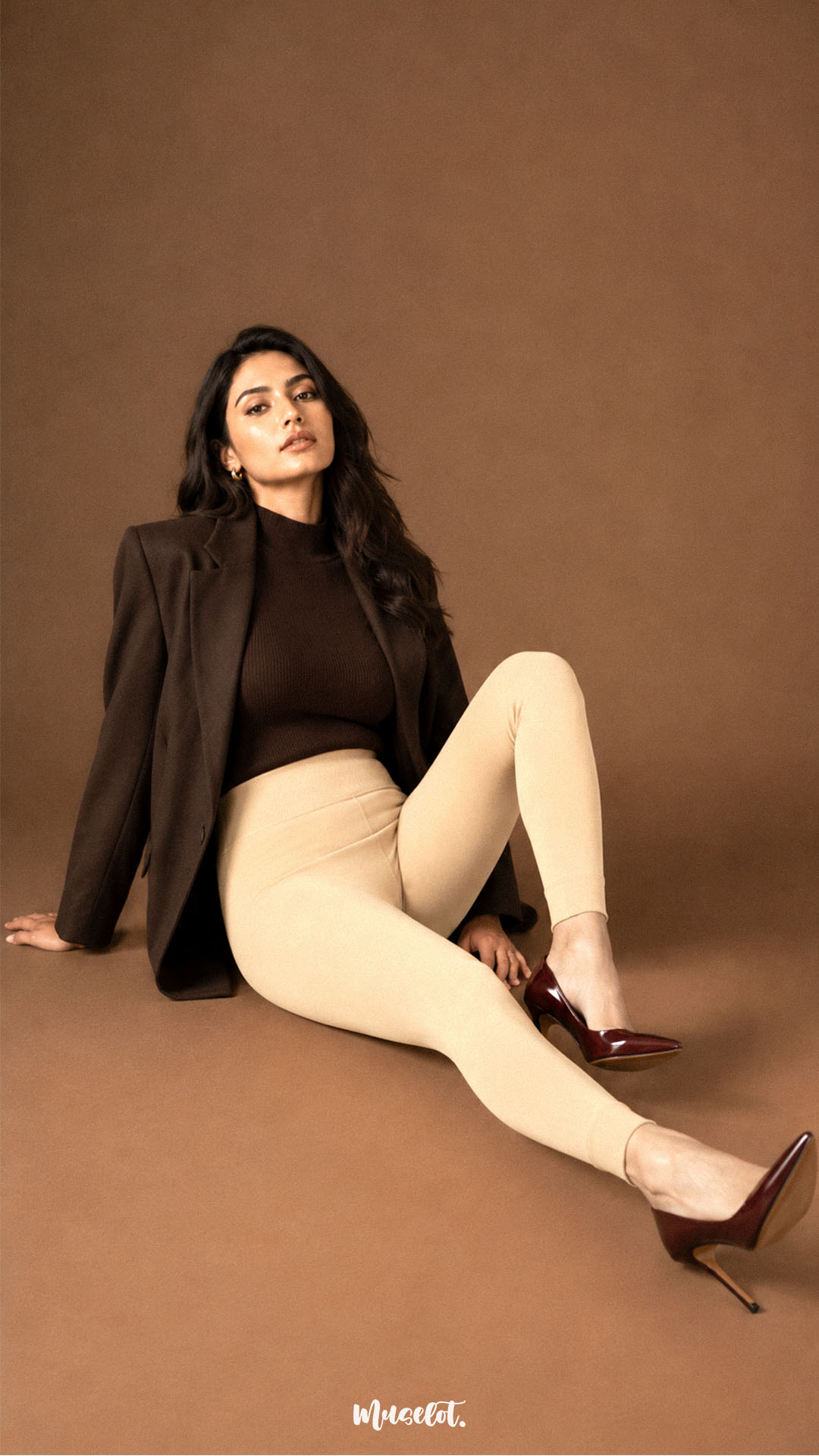 A woman wearing beige thermal stockings with open feet, full-leg opaque coverage and fitted ankle-length finish - Muselot