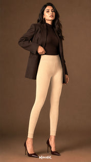 A front view of beige winter warm tights for women with high waist, smooth opaque finish and open-foot ribbed cuffs - Muselot