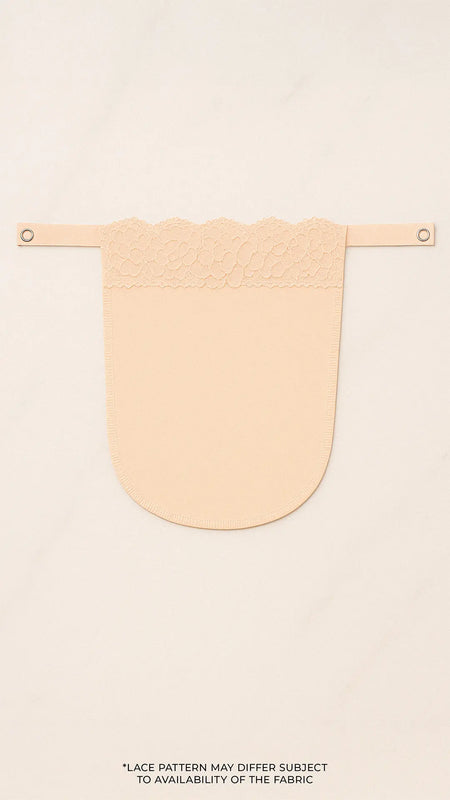 Beige solid mocker modesty panel in flatlay view, displaying intricate lacework and secure clip design for graceful deep-neck coverage — Muselot.