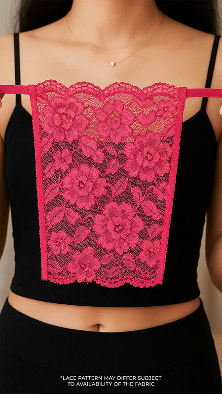 Close-up of model holding Lacy Magenta Mockers, highlighting the vibrant lace texture and stylish design for enhancing deep-neck outfits – Muselot.