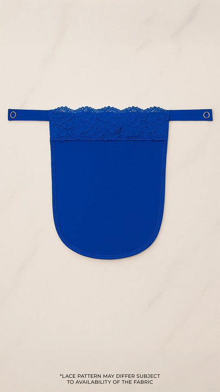 Royal blue lace mocker modesty panel in flatlay view, showcasing intricate floral lace design and secure clip fastening for deep-neck coverage — Muselot.