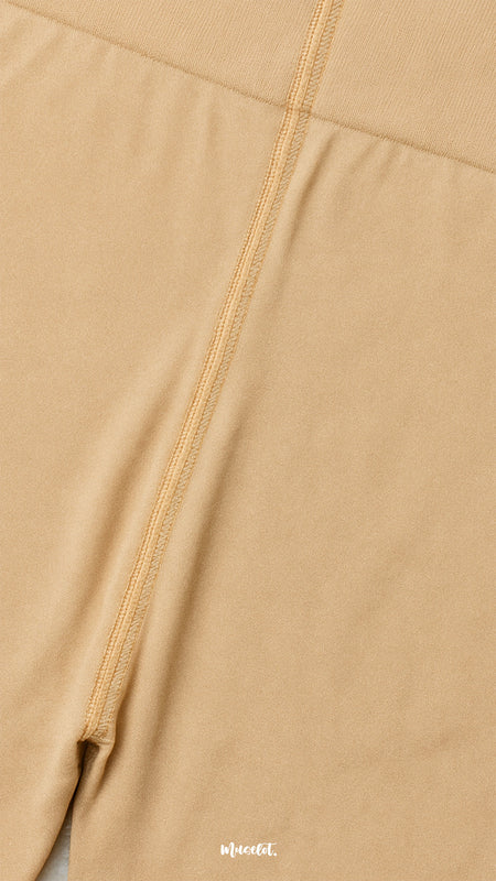 A close-up view of non-slip skin opaque tights waistband with fine stitching, highlighting secure fit, comfort, and durable finish - Muselot