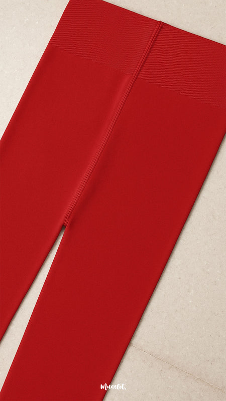 A close-up of secure waistband red semi-opaque tights, showcasing non-slip grip, durable stitching, and comfortable fit for all-day wear - Muselot