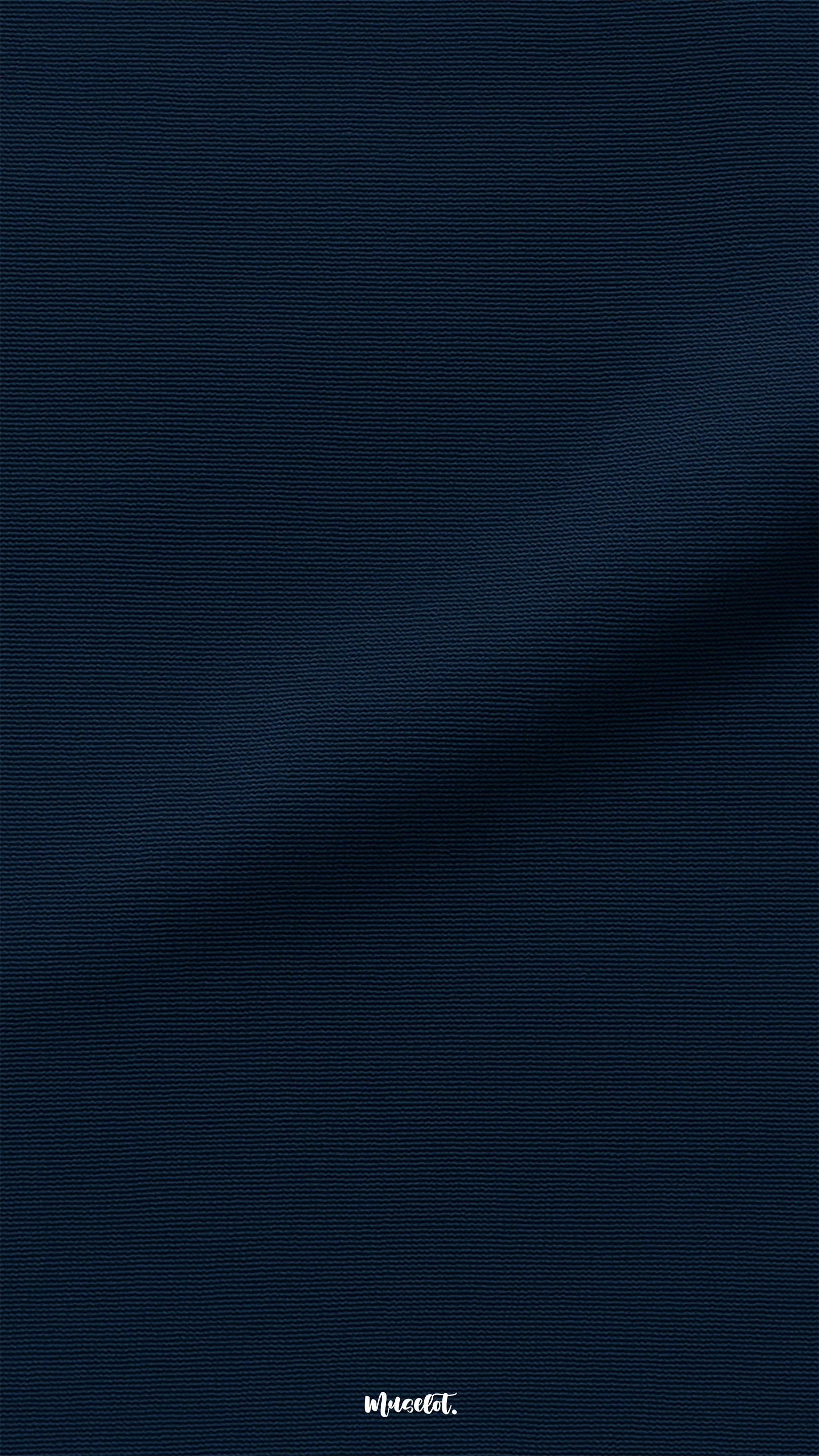 A close-up of navy blue semi-opaque tights fabric showing smooth texture, fine weave, and premium quality finish for comfort and durability - Muselot
