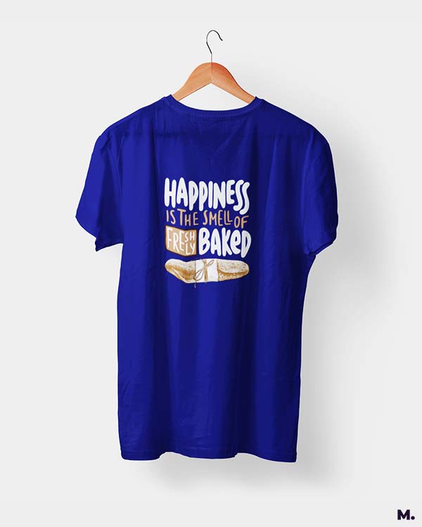 Royal blue t shirt printed with Happiness is smell of freshly baked bread for baking lovers.