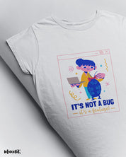 It's not a bug, it's a feature design illustrated graphic t shirt in white colour for coders at Muselot