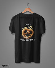 Life is a pretzel not a salt stick graphic illustrated printed t shirt in black colour at Muselot