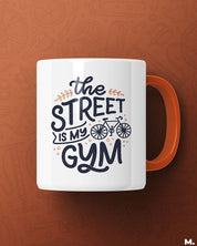 Orange printed mugs online for cyclists or peddlers - The street is my gym  - MUSELOT